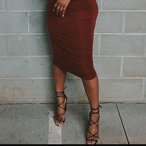 Lace up black heels.